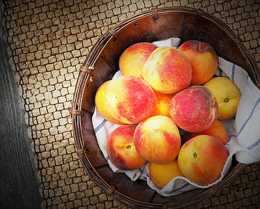 red apple lot on brown wooden basket thumbnail