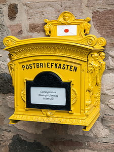 yellow wooden mail box thumbnail