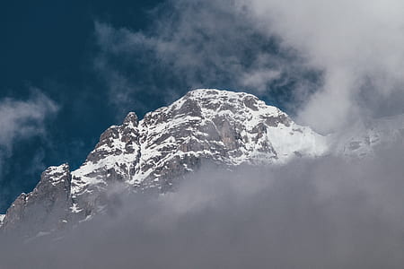 gray and white mountain filled with white snow thumbnail