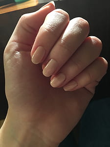 woman showing manicure thumbnail