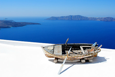 photo of beige wooden boat  on top of concrete floor thumbnail