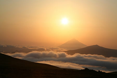 silhouette of mountains at daytime thumbnail
