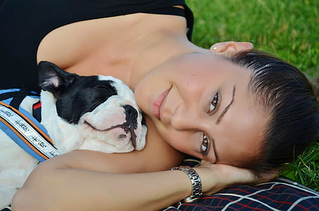 woman lying in grass with bulldoig thumbnail