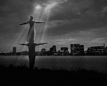 woman standing on mans shoulder thumbnail