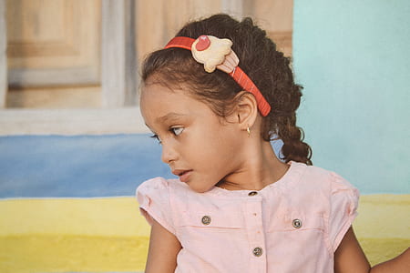 closeup photo of girl wearing pink top thumbnail
