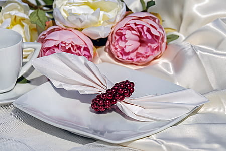 square white plate with white table napkin thumbnail