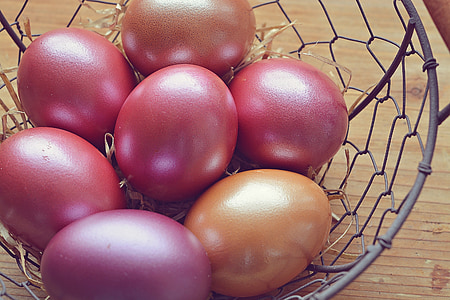 seven pink Easter eggs in basket thumbnail