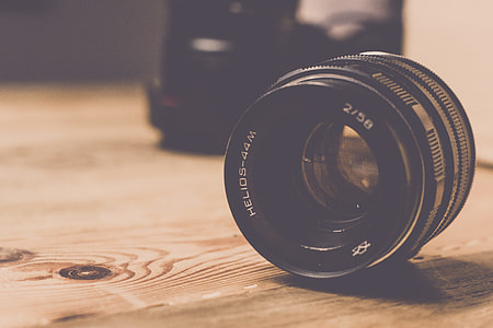 Camera Lens Wooden Table thumbnail