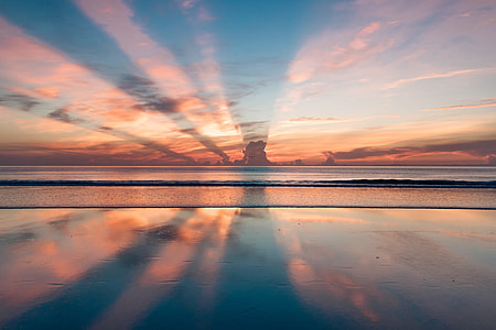 photo of beach shoreline during golden hour thumbnail