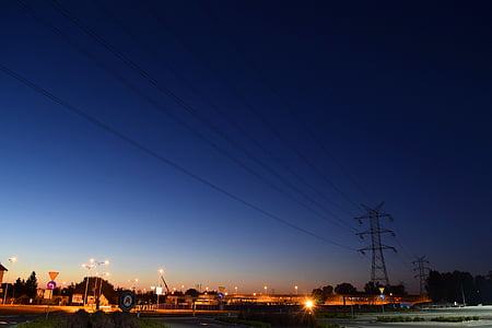landscape photography of city buildings under calm blue sky thumbnail