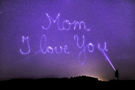 silhouette of person standing under starry night with mom i love you text overlay thumbnail