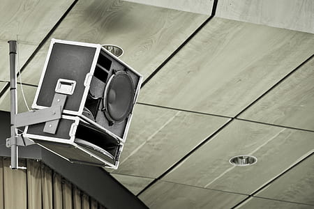 black and gray PA speaker with holder on ceiling thumbnail