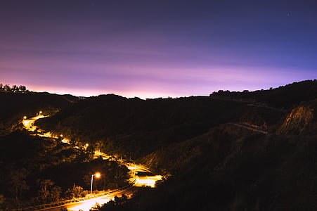 aerial photograph of concrete road during dusk thumbnail