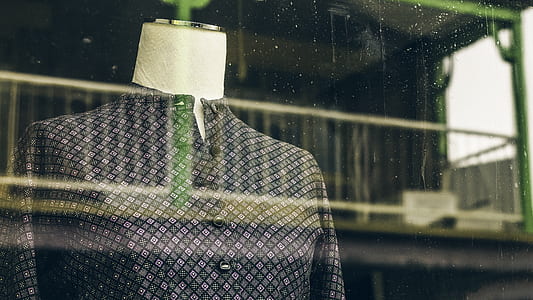 blue button-up dress in front of clear glass thumbnail
