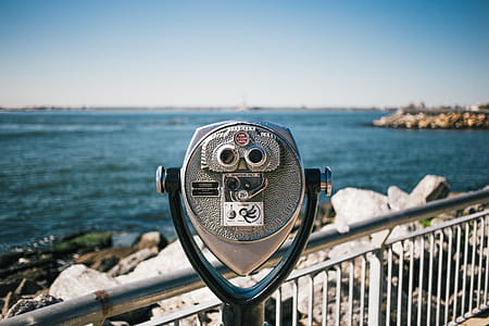 Binoculars Looking At Ocean Photo thumbnail