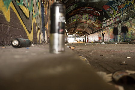 black and gray spray can on road thumbnail