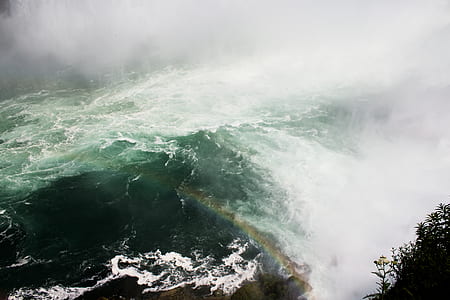 body of water with bubbles at daytime thumbnail