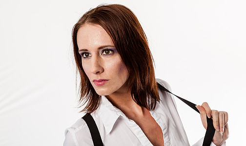 woman wearing white collared shirt holding suspender thumbnail