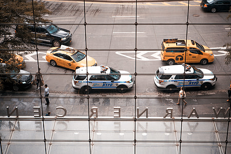 six cars on road during daytime thumbnail