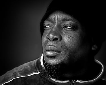 man in black knit cap thumbnail
