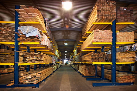 storage warehouse full of wooden planks and bars thumbnail