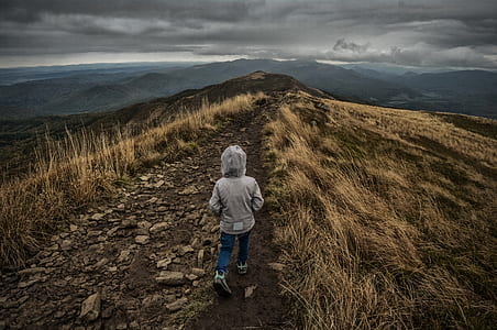 person walking on top of mountain thumbnail