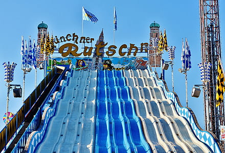 people at pool slide during daytime thumbnail