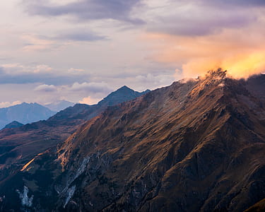 mountain rage view on cloudy sky during daytime thumbnail