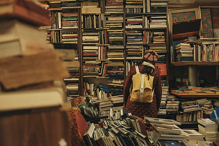 man on library wearing brown jacket thumbnail