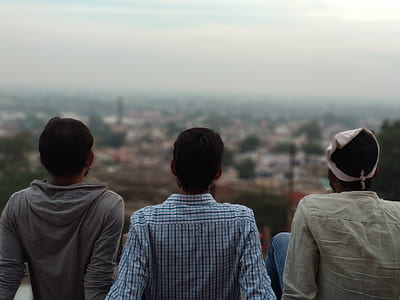 three men seating in shallow photography thumbnail