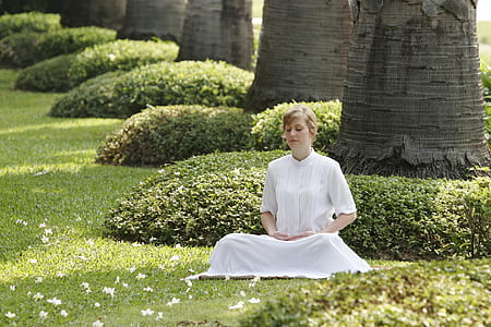 woman in white dress on green grass thumbnail