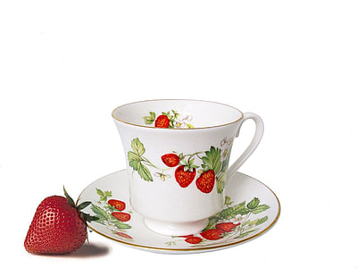 white and red strawberry-printed ceramic tea cup and saucer thumbnail