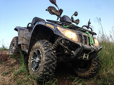black 4-wheel ATV thumbnail
