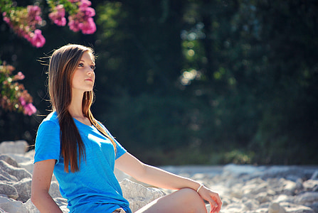 woman sitting on seashore thumbnail