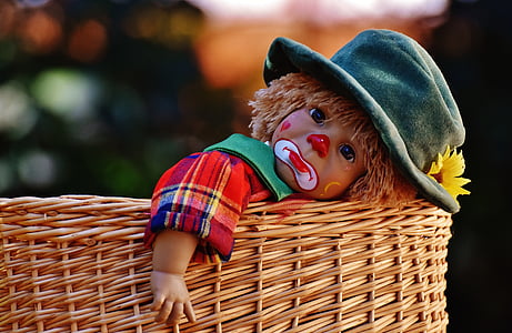 baby clown doll on basket thumbnail