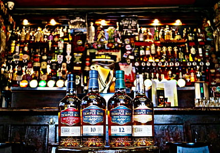 close up photo of four The Temple Bar liquor bottles thumbnail