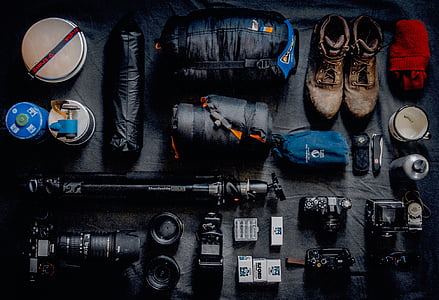 flat lane photo of camera kit and boots thumbnail