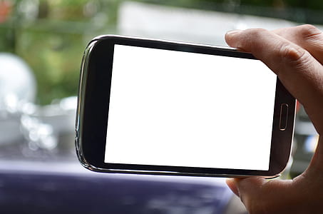 person holding black Samsung Galaxy smartphone thumbnail