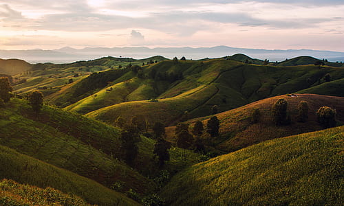 landscape photography of green hills thumbnail