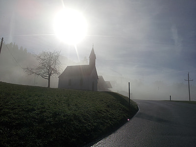 white church under sunny sky thumbnail