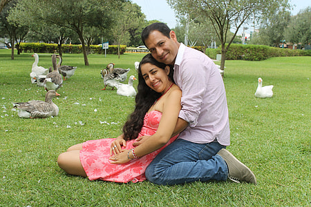 man hugging woman during daytime thumbnail