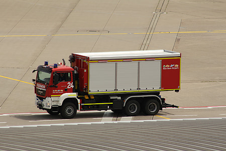 white and red truck travelling on airport plane runway thumbnail