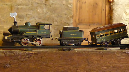 photography of grain steam locomotive train toys thumbnail