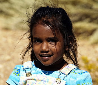 selective focus photo of a girl smiling thumbnail
