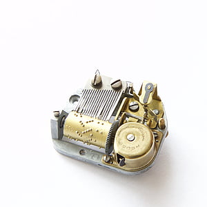 gray and brass-colored machine part thumbnail