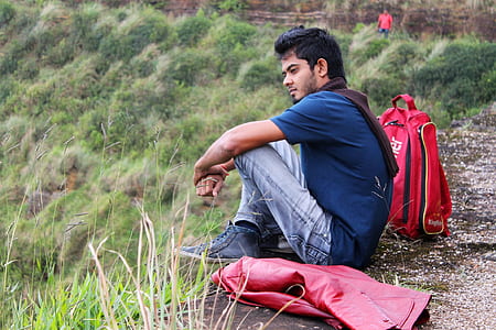 man sitting on ground thumbnail