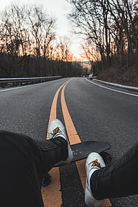 person showing black cruiser board thumbnail