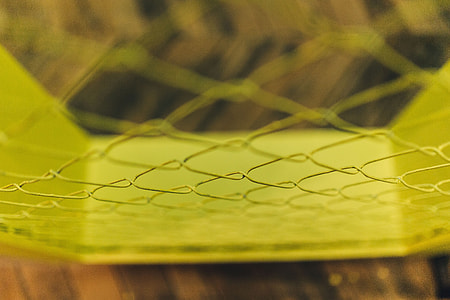 Close-ups of yellow wire netting thumbnail