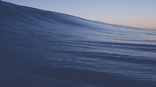 photo of water forming a giant wave thumbnail