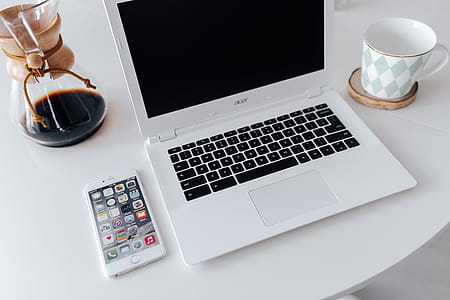 Workplace with laptop on table at home thumbnail